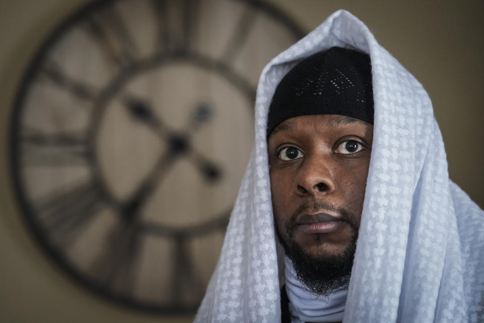 FILE - Myon Burrell is photographed at his home in Minneapolis, Dec. 17, 2020, two days after his release from prison. Burrell, a Black man who was sent to prison for life as a teenager but was set free in 2020 after 18 years behind bars, was arrested in a Minneapolis suburb Tuesday, Aug. 29, 2023, on potential gun and drug charges. (AP Photo/John Minchillo, File)