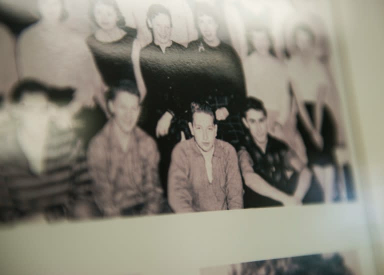 A photo of a young Bob Dylan (C) is on display at an exhibit in the Hibbing Public Library in Hibbing, Minnesota