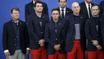 FILE - U.S. team captain Tom Watson, left, stands with his team during the trophy presentation after Europe won the 2014 Ryder Cup golf tournament, at Gleneagles, Scotland, Sunday, Sept. 28, 2014. The Americans will try to end 30 years of losing the Ryder Cup on European soil in Rome on Sept. 29-Oct. 1. (AP Photo/Matt Dunham, File)