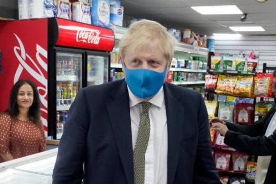 Boris Johnson was first pictured wearing a mask only last week (Downing Street)