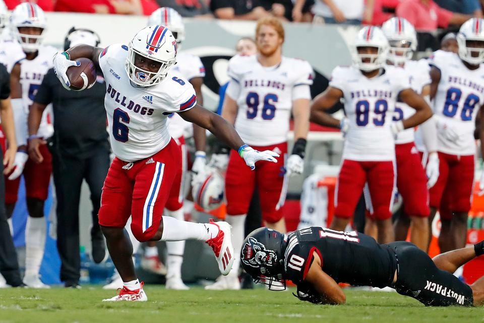 Louisiana Tech's Smoke Harris (6) breaks away from North Carolina State's Tanner Ingle (10) during a game Oct. 2, 2021, in Raleigh, N.C.