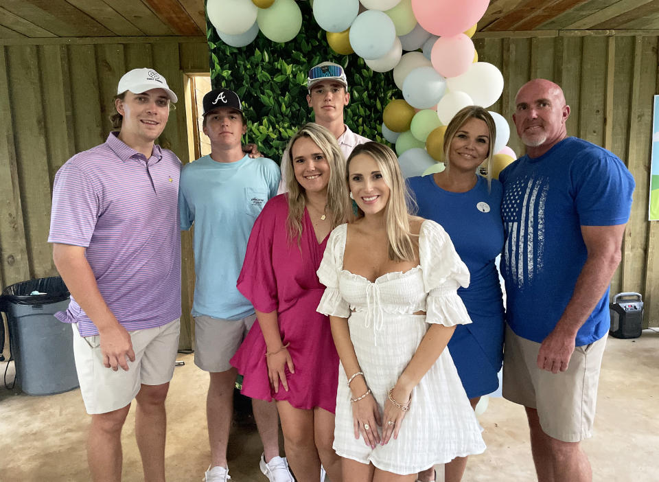 Sherry Head (2nd from the right, in blue) with family. (Courtesy Sherry Head)