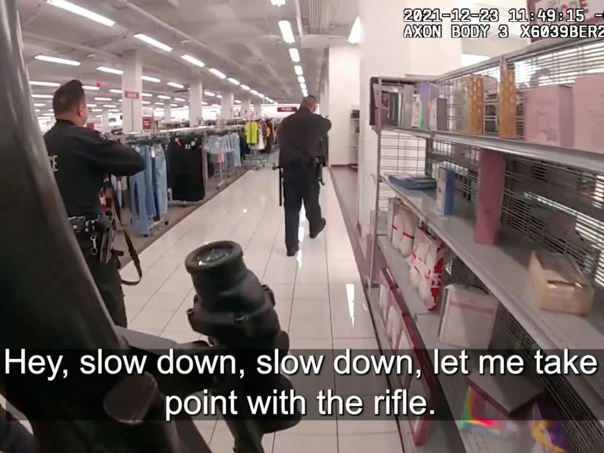 Officers urged cop to 'slow down' before he fatally shot a suspect and 14-year-old girl inside a Burlington Coat Factory, body-camera footage shows