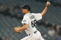 Seattle Mariners starting pitcher George Kirby throws against the Texas Rangers during the first inning of a baseball game, Wednesday, Sept. 28, 2022, in Seattle. (AP Photo/Caean Couto)