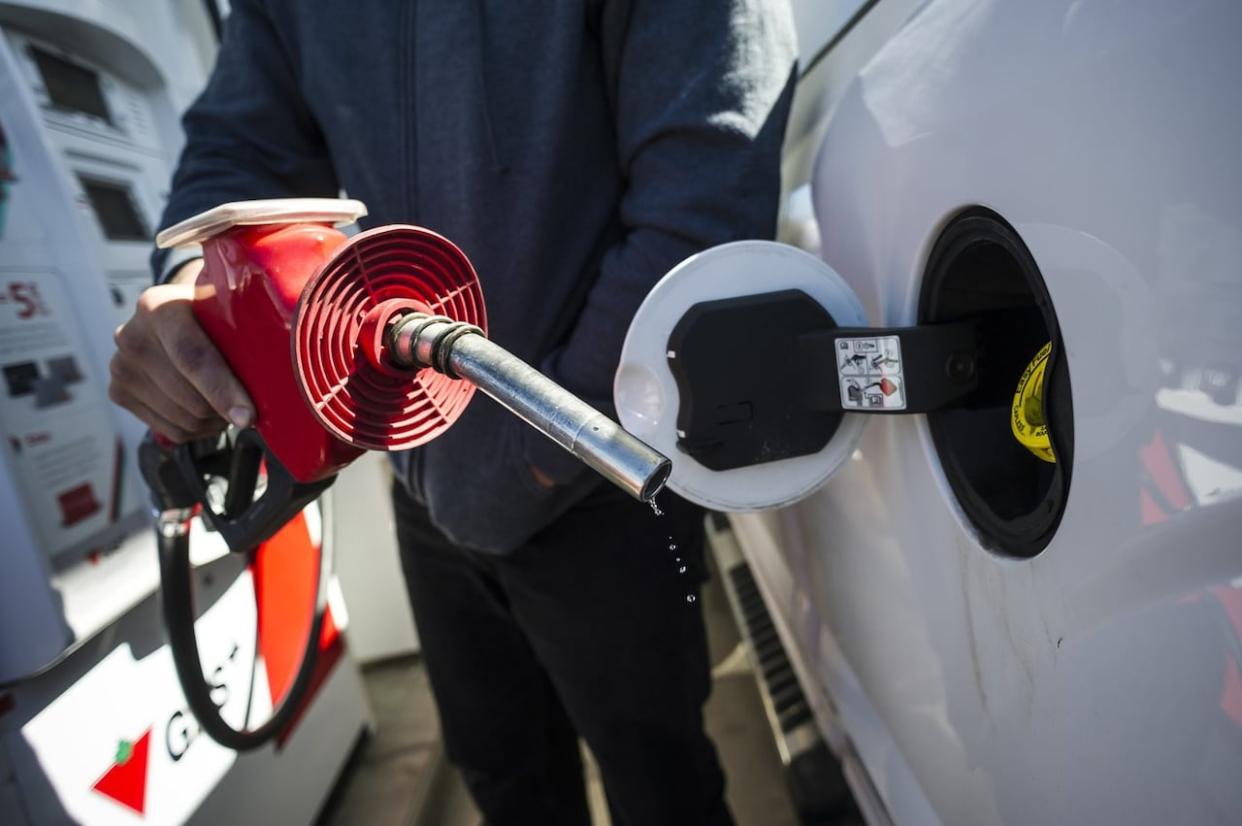A cut to the provincial gas tax promised by Premier Doug Ford before the June election will finally take effect on Friday. (Christopher Katsarov/The Canadian Press  - image credit)