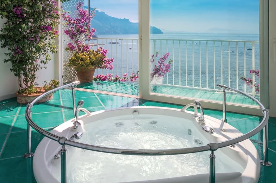 <p>If there's anything more appealing than a sunken whirlpool bath overlooking the Amalfi Coast, we're yet to find it. <a rel="nofollow noopener" href="http://www.hotelsantacaterina.it/en/special-suites" target="_blank" data-ylk="slk:Hotel Santa Caterina's Special Suites;elm:context_link;itc:0;sec:content-canvas" class="link ">Hotel Santa Caterina's Special Suites</a> also offer a king-size bed, a master bedroom and a private garden with heated "infinity pool" on the floor below.</p>