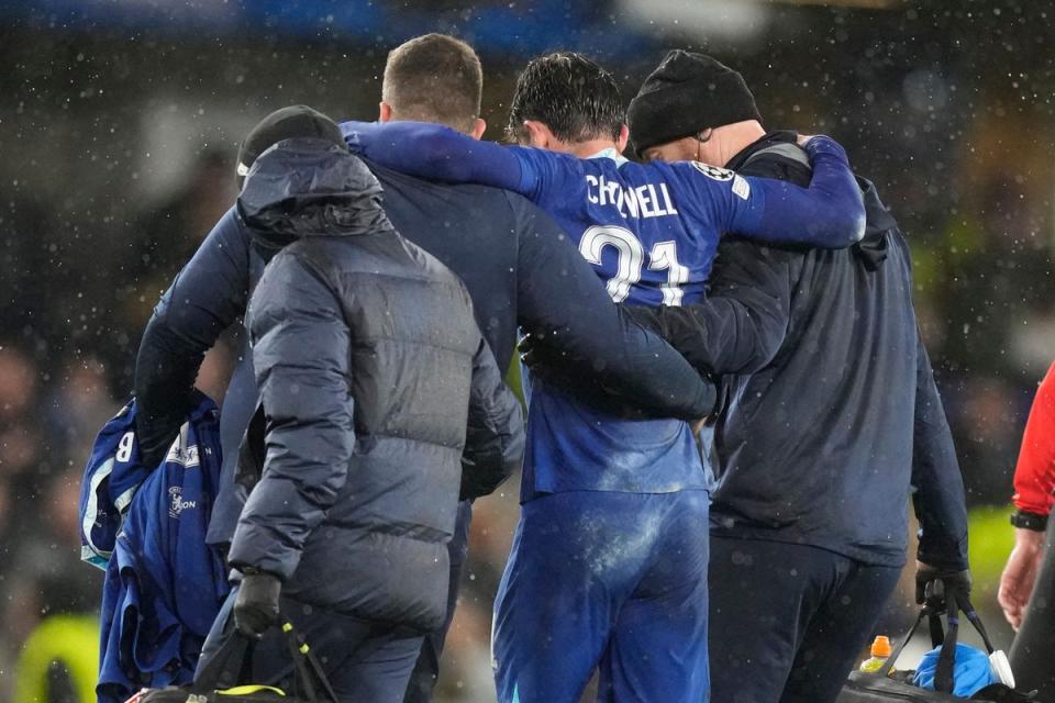 Chelsea’s Ben Chilwell is helped from the pitch after sustaining an injury in Zagreb (Frank Augstein/AP) (AP)