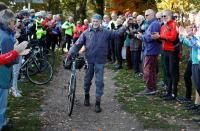 82 year old cyclist Russ Mantle celebrates after cycling his millionth mile following a ride in Mytchett, near Aldershot