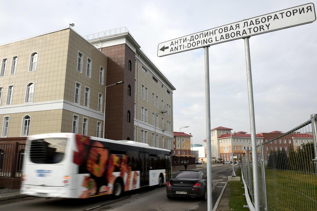 An official bus passes by the anti-doping laboratory of the 2014 Winter Olympic Games on February 21, 2014 at the Olympic Park  in Sochi, as a German athlete has failed a doping test - the first such case to hit the Sochi Games. The German Olympic Sports Confederation (DOSB) said it had been informed by the International Olympic Committee (IOC) that the 