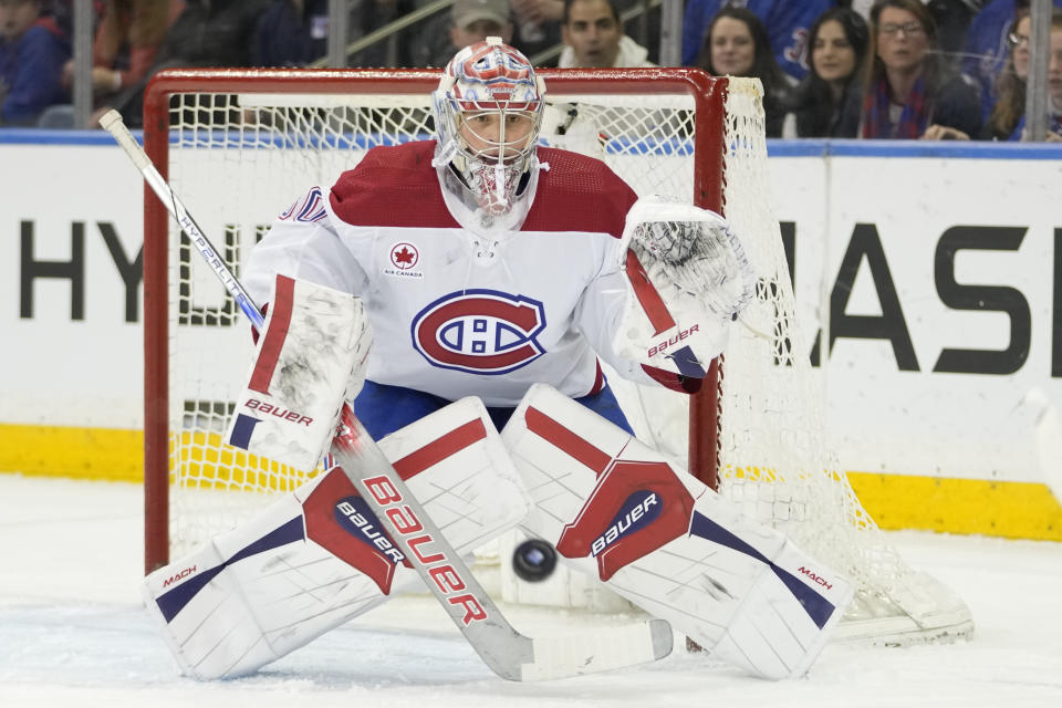 Montreal Canadiens goaltender Cayden Primeau makes a save against the New York Rangers during the first period of an NHL hockey game, Sunday, April 7, 2024, at Madison Square Garden in New York. (AP Photo/Mary Altaffer)
