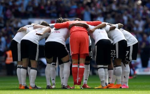 Fulham players huddle - Credit: ACTION IMAGES