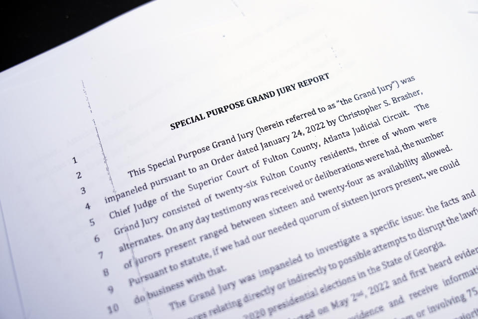 Portions of a report issued by a special grand jury looking into possible meddling in the 2020 election in Georgia are shown after being released Thursday, Feb. 16, 2023, in Atlanta. (AP Photo/John Bazemore)