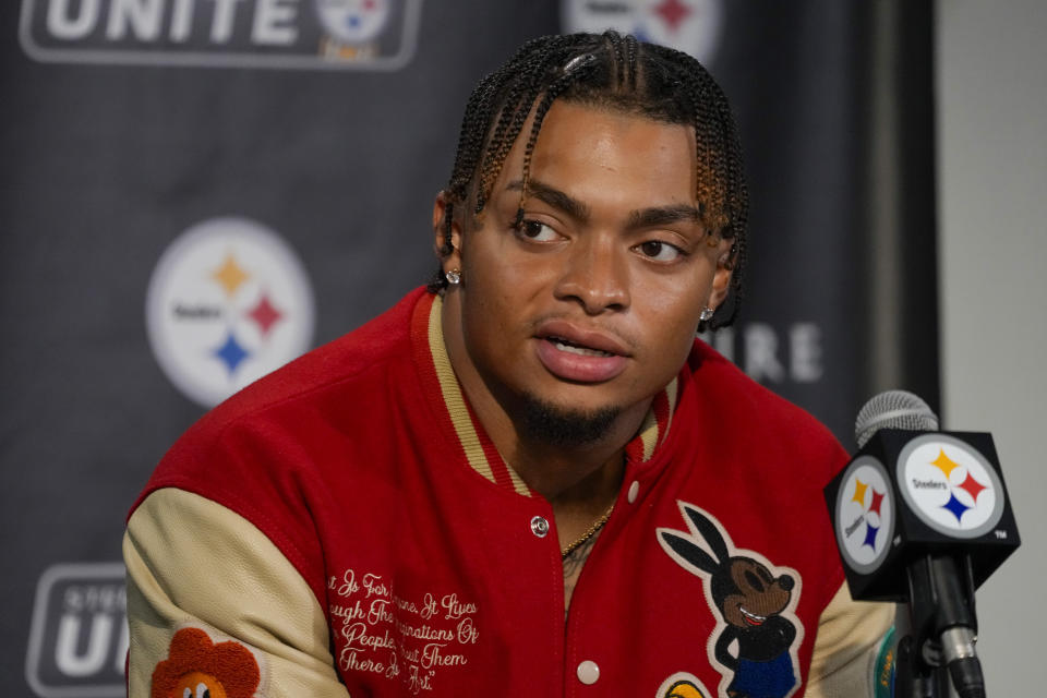 Pittsburgh Steelers quarterback Justin Fields talks to reporters following an NFL football game against the Dallas Cowboys, early Monday, Oct. 7, 2024, in Pittsburgh. The Cowboys won 20-17. (AP Photo/Gene J. Puskar)