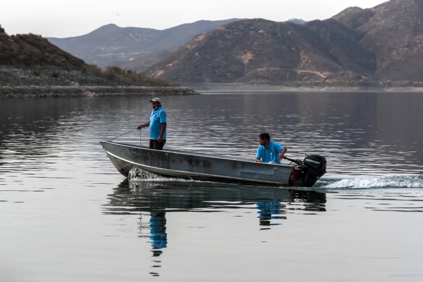 Hemet, CA, Wednesday, June 16, 2021 - Diamond Valley Lake in Riverside County, the major drinking water storage facility for 18 million Southern Californians, as well as an insurance policy against just such a dry time as this. The Metropolitan Water District's 21-year-old reservoir holds enough drinking water to meet the region's emergency needs for six months. Lake employees ride near the marina. (Robert Gauthier/Los Angeles Times)