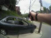 University of Cincinnati police officer Ray Tensing's body camera shows his handgun drawn at a car that came to a stop after driver Samuel Dubose was pulled over and shot during a traffic stop in Cincinnati, Ohio July 19, 2015, in a still image from video released by the Hamilton County Prosecutor's Office on July 29, 2015. A University of Cincinnati police officer who fatally shot an unarmed black man has been charged with murder after a grand jury investigation, the Hamilton County prosecutor said on Wednesday. (REUTERS/Hamilton County Prosecutor's Office/Handout)