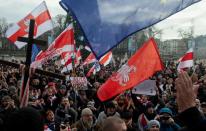 People take part in a rally against integration agreements between Belarus and Russia, in Minsk