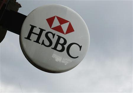 The signage of the HSBC bank is seen at a branch at Hayes in west London February 24, 2014. REUTERS/Luke MacGregor