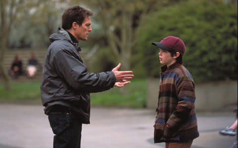 Hugh Grant imparts life lessons in About A Boy - Credit: Film Stills