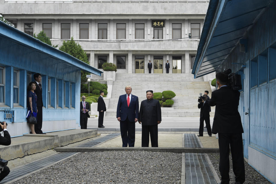 FILE - In this June 30, 2019, file photo, President Donald Trump meets with North Korean leader Kim Jong Un at the border village of Panmunjom in the Demilitarized Zone, South Korea. After two years in the spotlight at the U.N. General Assembly, North Korea this year is mostly an afterthought. The nation warranted only a single, rehashed sentence in Trump’s address and has been largely overshadowed by other standoffs and scandals. (AP Photo/Susan Walsh, File)