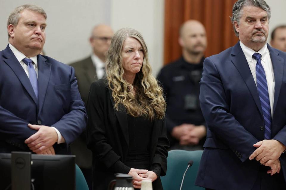 Lori Vallow Daybell stands and listens as the jury’s verdict is read at the Ada County Courthouse in Boise, Idaho on Friday May 12, 2023. The Idaho jury convicted Daybell of the first-degree murders of her two youngest children and Chad Daybell’s then-wife, a verdict that marks the end of a three-year investigation that included bizarre claims of zombie children, apocalyptic prophesies and illicit affairs.