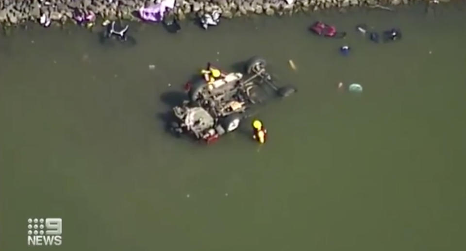 The submerged car in Wyaralong Dam. It was carrying six people on board.