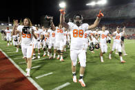 Tight end Tyler Perry #88 of the Oregon State Beavers celebrates with teammates after defeating the Arizona Wildcats in the college football game at Arizona Stadium on September 29, 2012 in Tucson, Arizona. The Beavers defeated the Wildcats 38-35. (Photo by Christian Petersen/Getty Images)