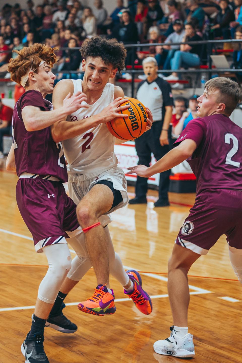 Dewey's Jake LaSpisa makes a lane towards to basket during Friday night's game vs. Nowata.