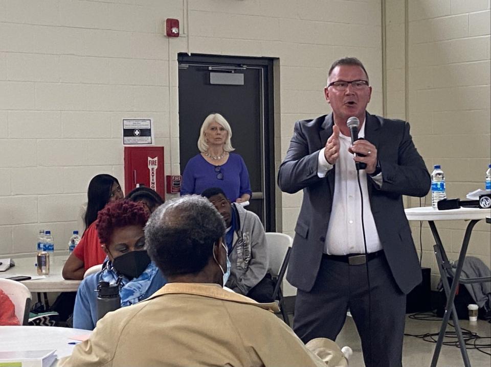 Consultant Tracy Richter describes options for high school restructuring and consolidation to South Bend community members in a meeting on Thursday, May 5, 2022, at the Charles Black Community Center.