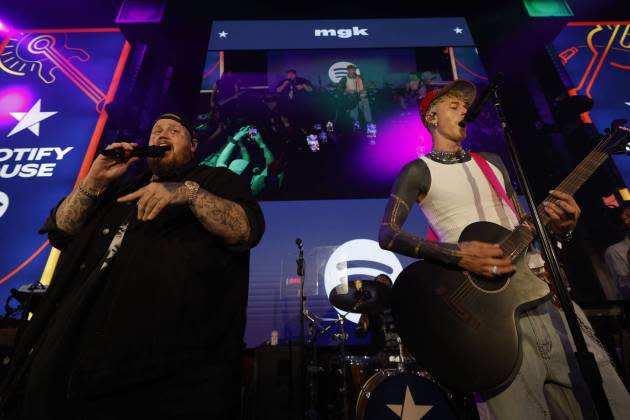 Jelly Roll and MGK perform at the Spotify House at CMA Fest 2024 - Credit: Brett Carlsen/Getty Images for Spotify