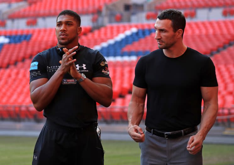 Anthony Joshua and Wladimir Klitschko during the press conference at Wembley Stadium, London. PRESS ASSOCIATION Photo. Picture date: Wednesday December 14, 2016. See PA story BOXING Wembley. Photo credit should read: John Walton/PA Wire