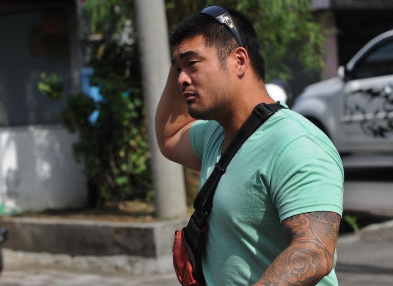 Michael Chan arrives to visit his brother Andrew, currently on death row in Indonesia, at Kerobokan prison in Denpasar, Bali island, on February 22, 2015