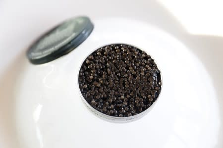 A can of Rova caviar is served on ice at the Marais restaurant in Antananarivo