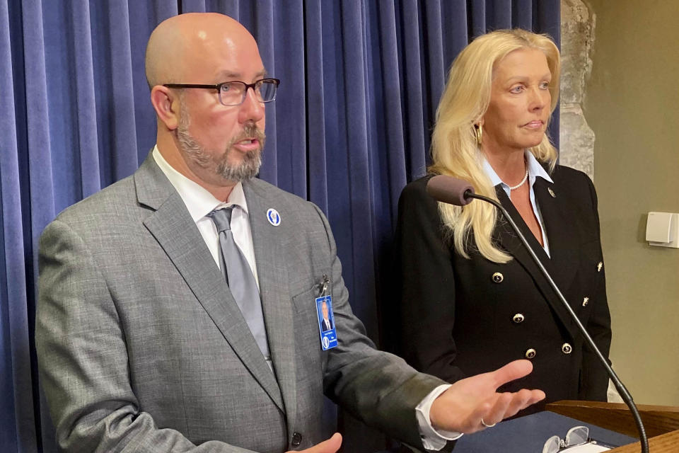 Rep. Lance Yednock, D-Ottawa, left, discusses the legislation to allow new nuclear reactors in Illinois which he co-sponsored with Sen. Sue Rezin, R-Morris, after it cleared both chambers on Thursday, Nov. 9, 2023, in Springfield, Ill. (John O'Connor/AP)