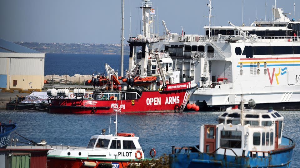 Humanitarian aid for Gaza is loaded on a platform next to a rescue vessel of the Spanish NGO Open Arms at the port of Larnaca, Cyprus on March 11. - Yiannis Kourtoglou/Reuters