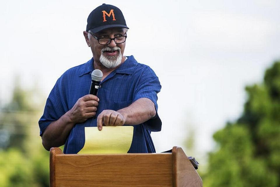 Dave Nannini speaks to the crowd during a ceremony to award scholarships in the names of his sons Kevin and Brian prior to the 13th annual Nannini Game between Merced and Golden Valley at Merced High School in Merced, Calif., Friday, April 29, 2016. The game is named for Nannini’s sons Kevin and Brian who drowned in a boating accident in 2004.