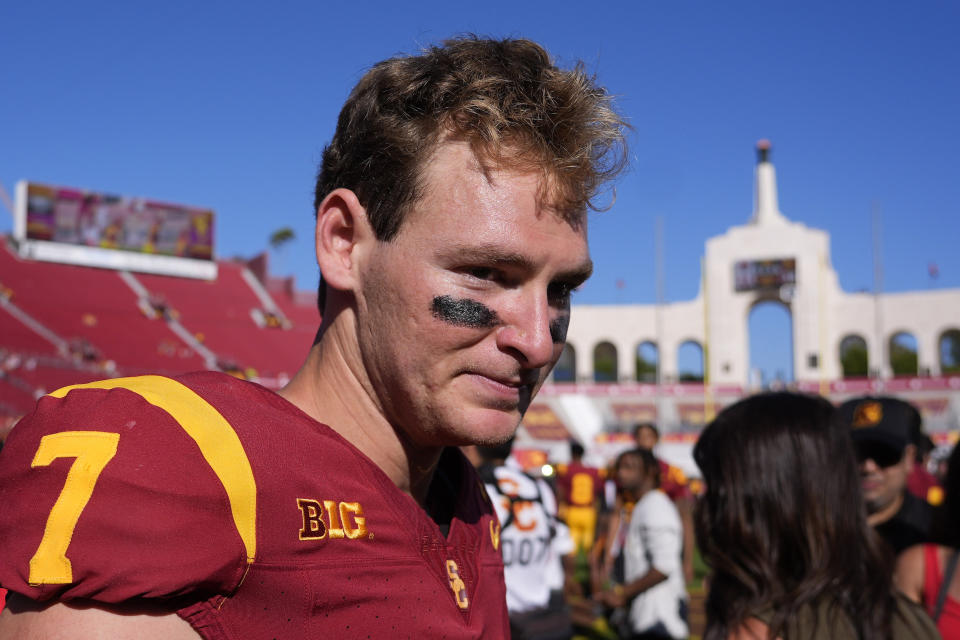 Southern California quarterback Miller Moss walks off the field after USC defeated Wisconsin 38-21 in an NCAA college football game, Saturday, Sept. 28, 2024, in Los Angeles. (AP Photo/Mark J. Terrill)