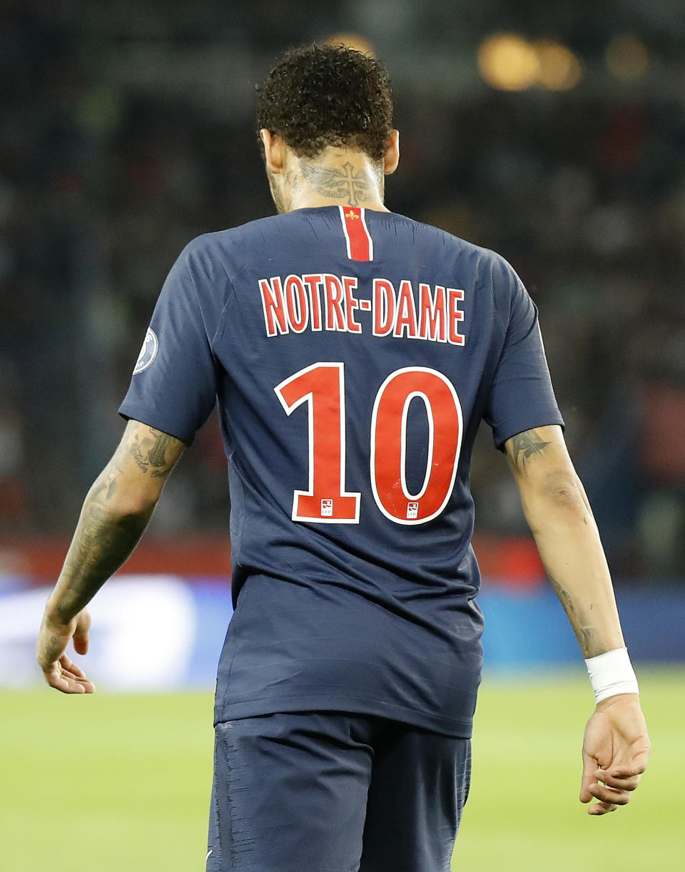 PSG's Neymar walks away during the French League One soccer match between Paris-Saint-Germain and Monaco at the Parc des Princes stadium in Paris, Sunday April 21, 2019. (AP Photo/Michel Euler)