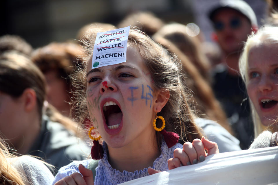 People take part in the Global Climate Strike of the movement Fridays for Future, in Munich, Germany, September 20, 2019. The slogan on the sticker reads: "could have, would have, wanted, do it!". (Photo: Michael Dalder/Reuters)