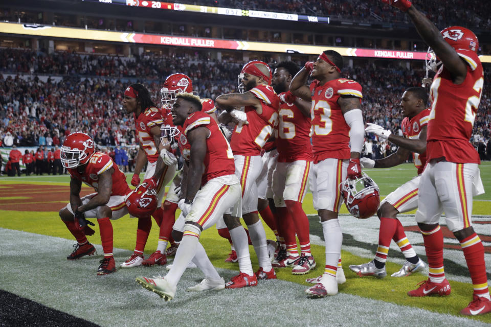 Kansas City Chiefs players celebrate during the second half of the NFL Super Bowl 54 football game against the San Francisco 49ers Sunday, Feb. 2, 2020, in Miami Gardens, Fla. The Kansas City Chiefs won 31-20. (AP Photo/Wilfredo Lee)