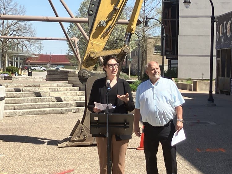 Rock Island Mayor Mike Thoms listens as Kristin Richards, head of the Illinois Department of Commerce and Economic Opportunity, speaks at the ceremonial groundbreaking Monday for the $8.7-million Rebuild Downtown project (photo by Jonathan Turner).