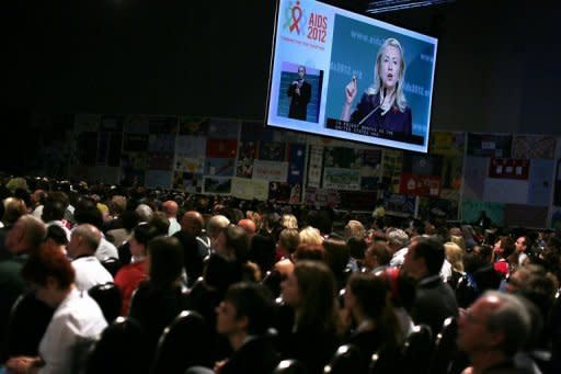 U.S. Secretary of State Hillary Clinton delivers remarks at the opening plenary of the 19th International AIDS Conference in Washington, DC. Clinton vowed Monday that the United States will step up the fight against HIV, insisting it was working towards the goal of achieving an AIDS-free generation