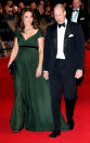 <p>The expectant mom glowed in green at the BAFTA Awards on Sunday night, while her husband looked dashing in a tuxedo with tails. (Photo: Max Mumby/Indigo/Getty Images) </p>