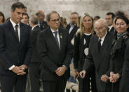 Spain's Prime Minister Pedro Sanchez stands next to Catalan President Quim Torra along with Bernabe Marti, husband of Montserrat Caballe and her daughter Montserrat Marti (R), during the funeral of Spanish opera singer Montserrat Caballe in Barcelona, Spain, October 8, 2018. Andreu Dalmau/Pool via Reuters