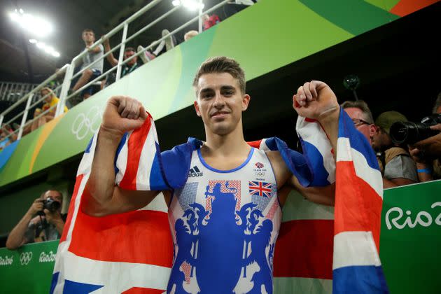 Max Whitlock celebrates winning the gold medal after the men's pommel horse final.  (Photo: Alex Livesey via Getty Images)