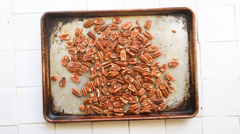 Pecans toasting on tray