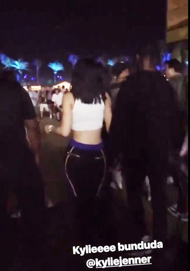 Travis and Kylie are seen holding hands while walking around Coachella. Source: Twitter