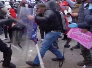 Image: Ralph Joseph Celentano with a folding chair on his back. (U.S. attorney for Washington, D.C.)