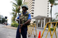 A security officer keeps watch outside a luxury hotel in Colombo, Sri Lanka April 27, 2019. REUTERS/Thomas Peter