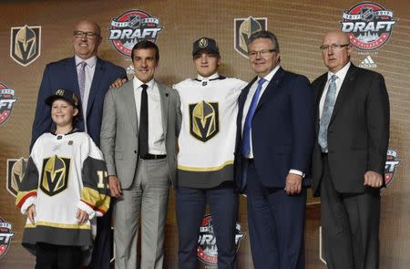 June 23, 2017; Chicago, IL, USA; Erik Brannstrom poses for photos after being selected as the number fifteen overall pick to the Vegas Golden Knights in the first round of the 2017 NHL Draft at the United Center. Mandatory Credit: David Banks-USA TODAY Sports