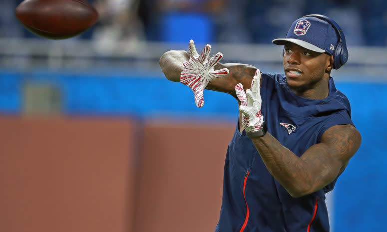 Josh Gordon catches a pass ahead of New England Patriots Vs Detroit Lions At Ford Field